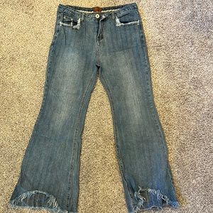 Super cool distressed bell bottom jeans